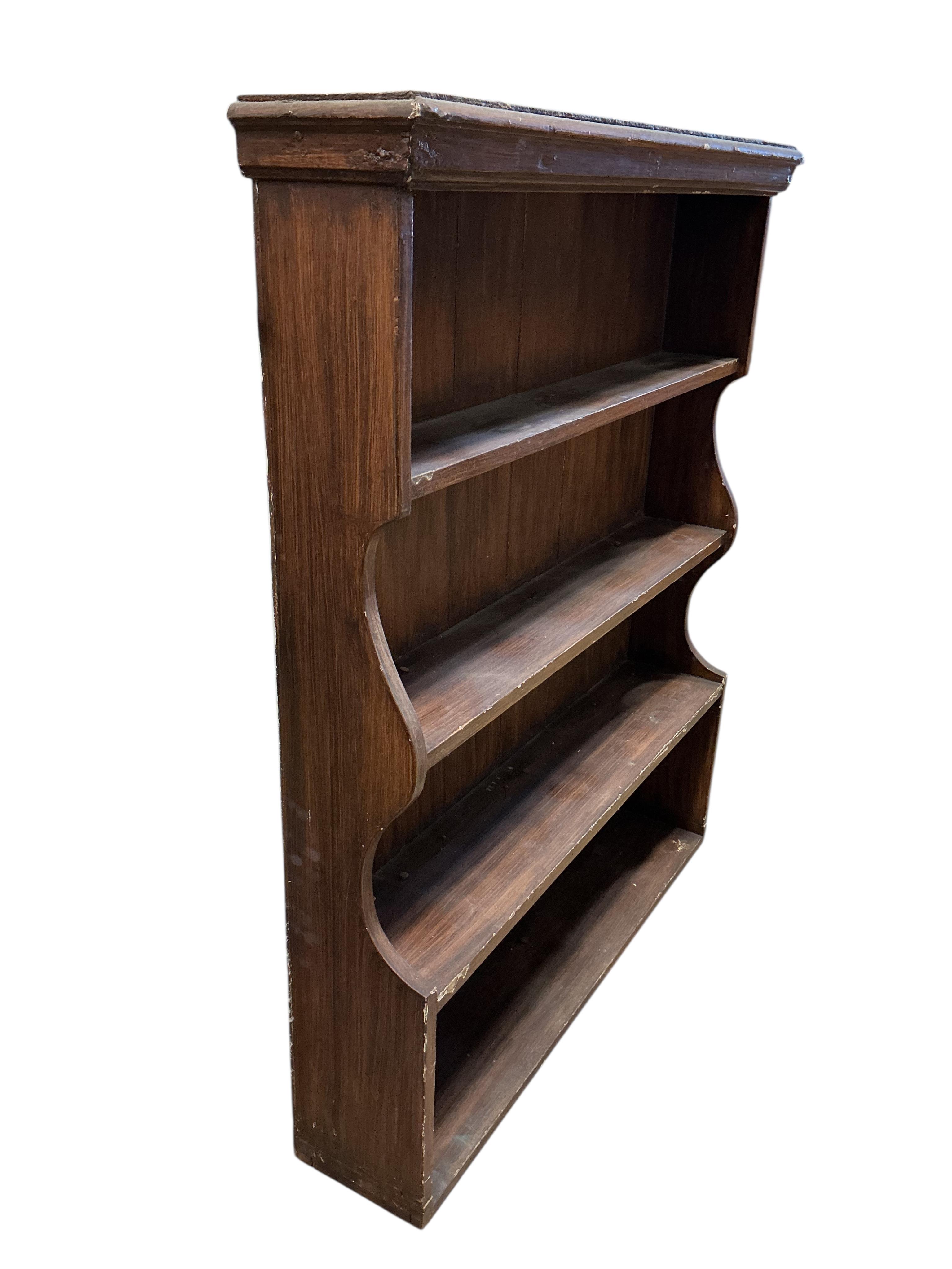 A 19th century plate rack, with painted simulated grain, width 96cm, depth 19cm, height 113cm